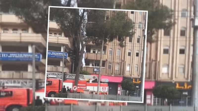 Ağır hasarlı binadan alevler yükseldi 